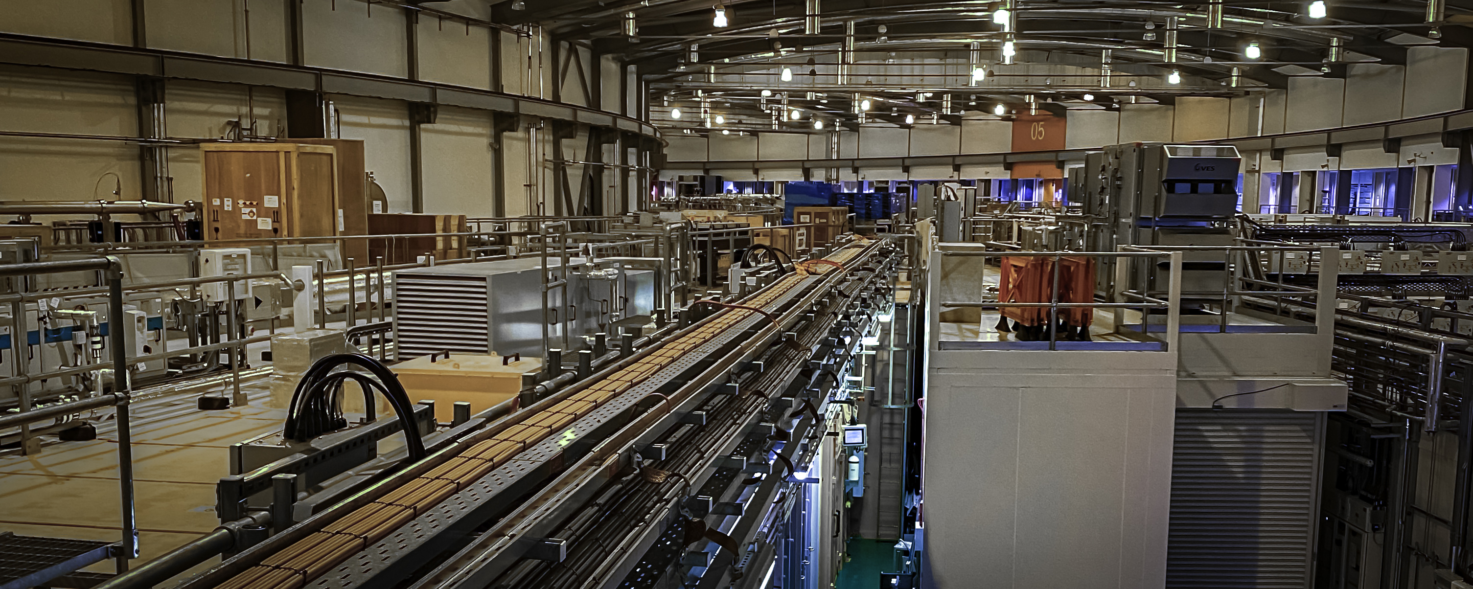 The long beamline hall at the synchrotron facility used for the round-the-clock imaging campaign.